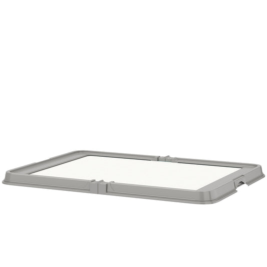 Gray dog pee pad holder assembled and ready to use indoors