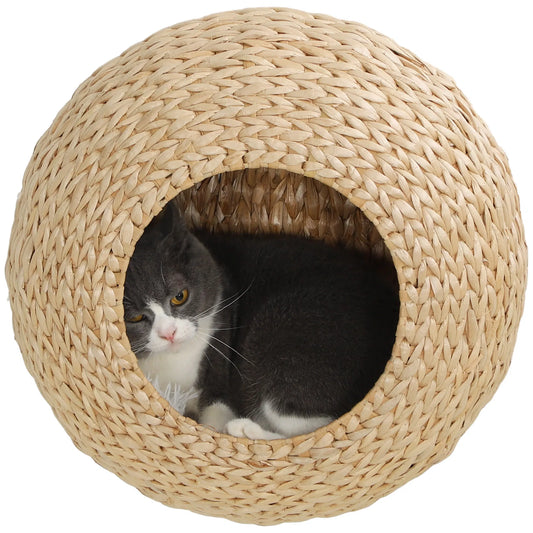 Beige wall-mounted woven cat cave with round entrance, removable cream cushion, and small cat resting inside