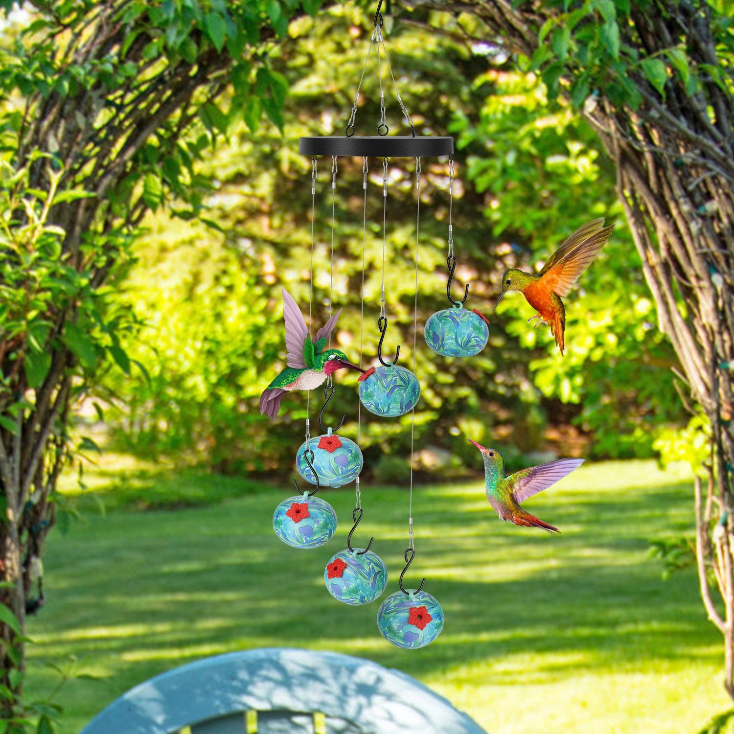 Hummingbird feeder wind chime detail – metal base with hanging feeder balls