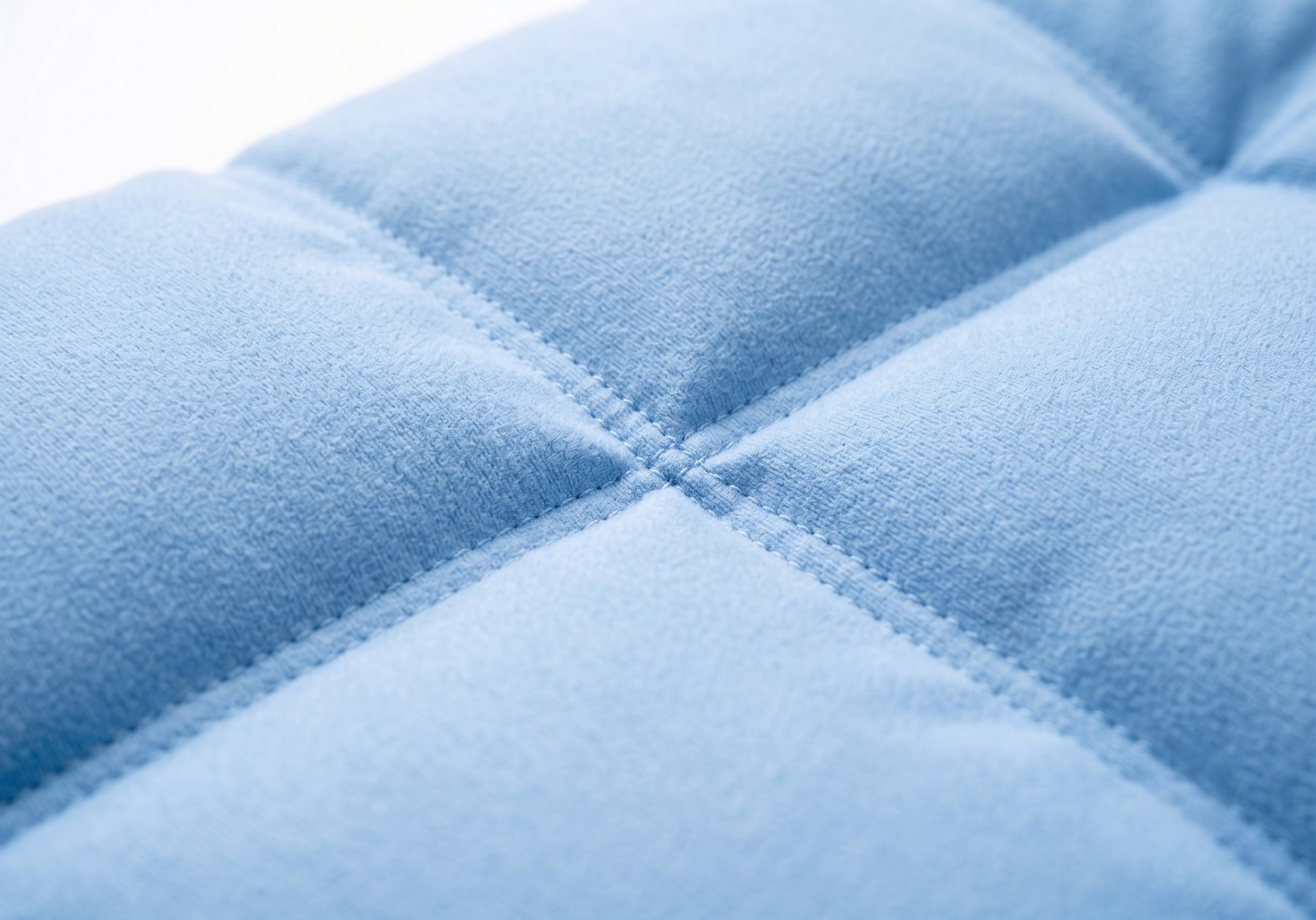 Close-up of 8-panel quilted stitching on light blue dog 
cooling mat – ultra-soft plush texture – GianfiStore
