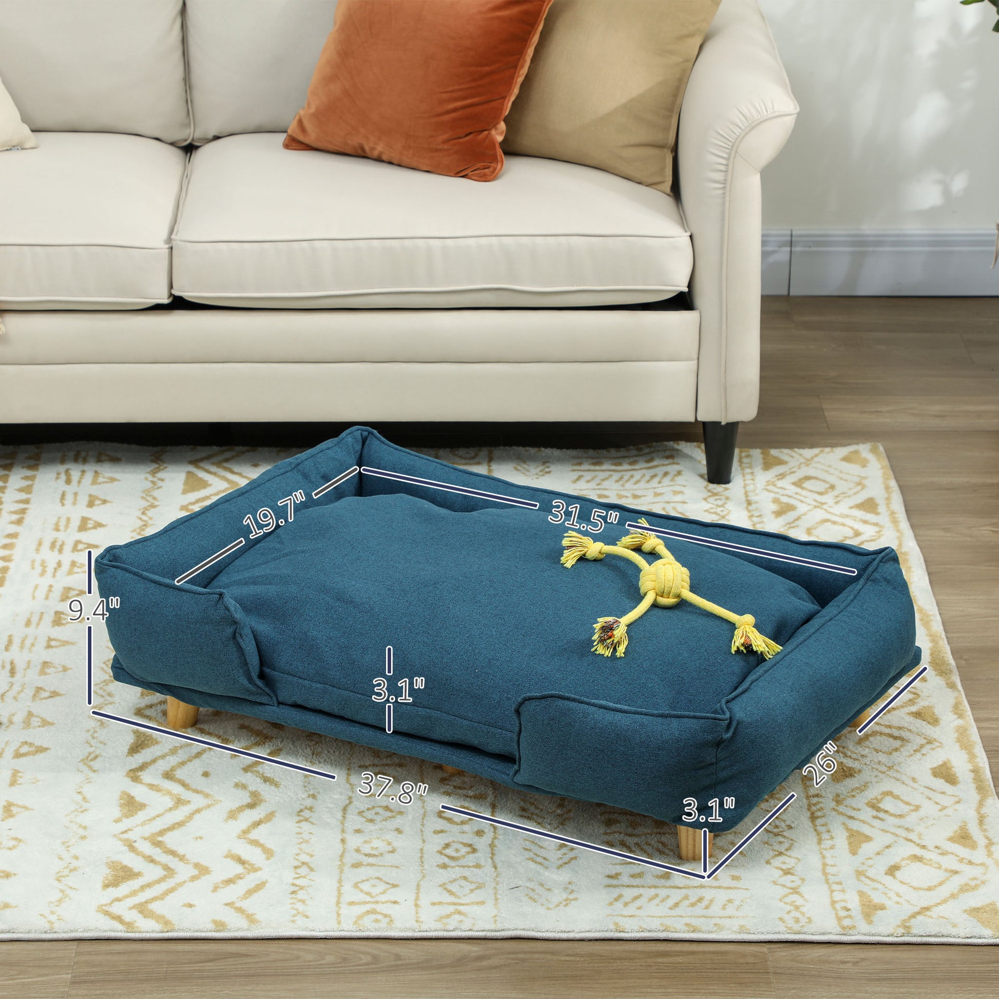 Raised pet sofa close-up – soft polyester cushion and solid pine wood frame detail