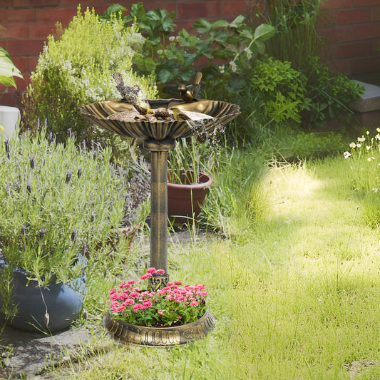 Antique bronze bird bath with two bird statues in a garden setting